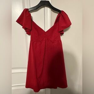 Red short heart shaped neck dress that ties in the back with a bow